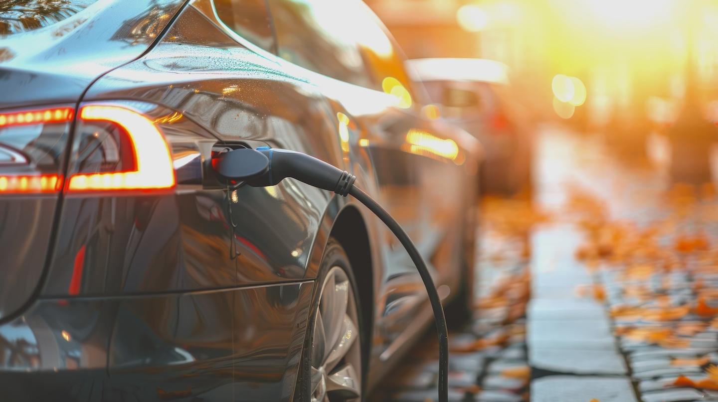 Electric car charging on the roadside